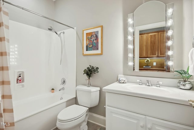 full bathroom with toilet, shower / bath combo with shower curtain, and vanity