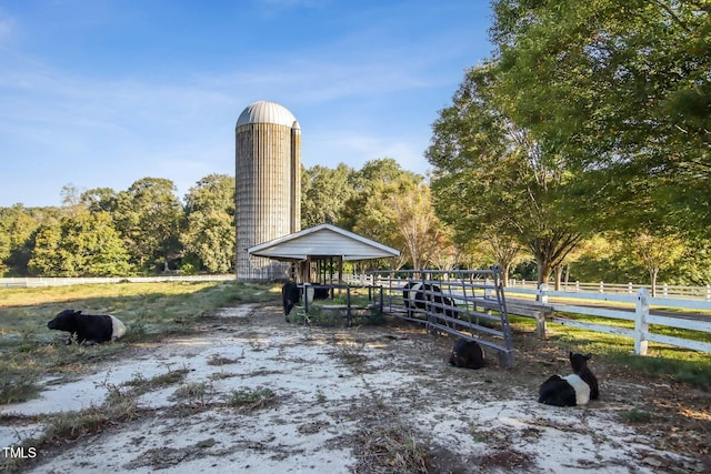 surrounding community featuring fence