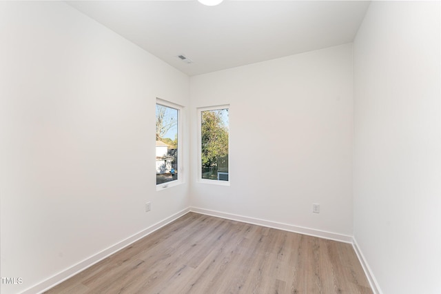 112 N Guthrie Ave Unit A, Durham, NC 27703 - empty room featuring light wood-style flooring and baseboards