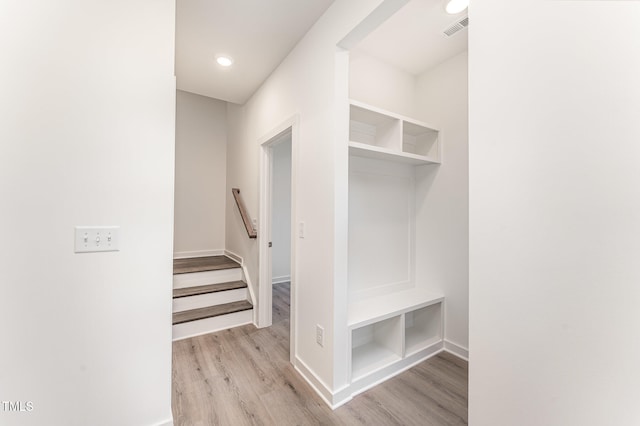 mudroom with baseboards, visible vents, recessed lighting, and light wood-style floors