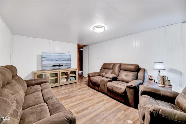 living room with light hardwood / wood-style floors