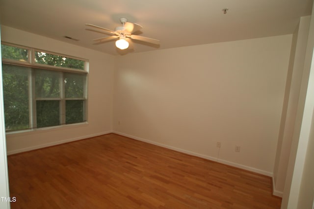 1001 Hillsborough St Unit 304, Raleigh, NC 27603 - unfurnished room with wood finished floors and a ceiling fan