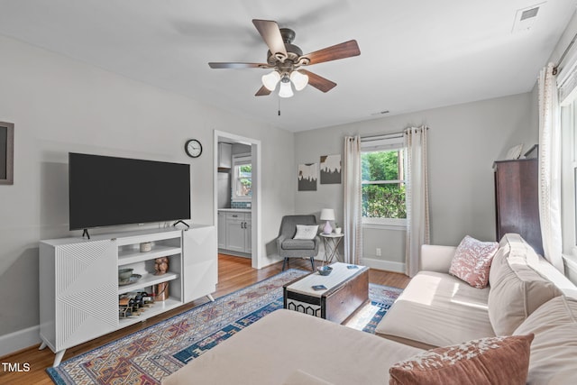 1209 Edgevale Rd, Durham, NC 27701 - living area with ceiling fan and light wood-type flooring