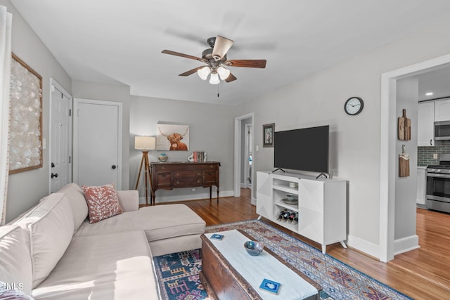 1209 Edgevale Rd, Durham, NC 27701 - living area featuring ceiling fan and light wood-style flooring