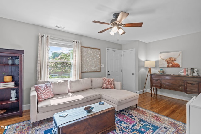 1209 Edgevale Rd, Durham, NC 27701 - living area featuring a ceiling fan and wood finished floors