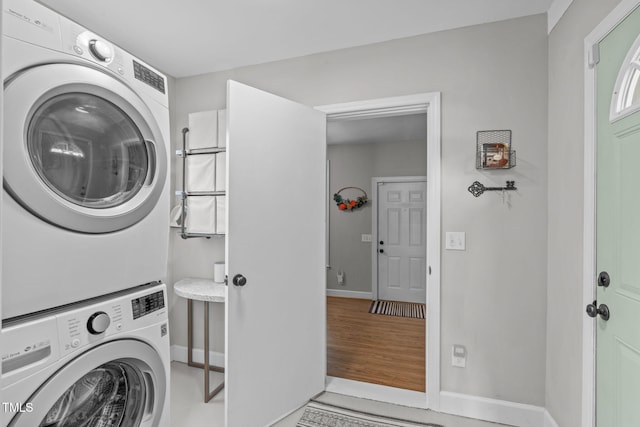 1209 Edgevale Rd, Durham, NC 27701 - laundry room with stacked washer / dryer and baseboards