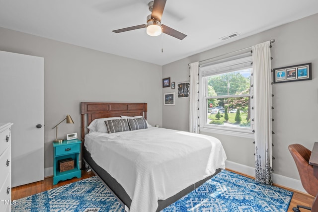 1209 Edgevale Rd, Durham, NC 27701 - bedroom with wood finished floors and a ceiling fan