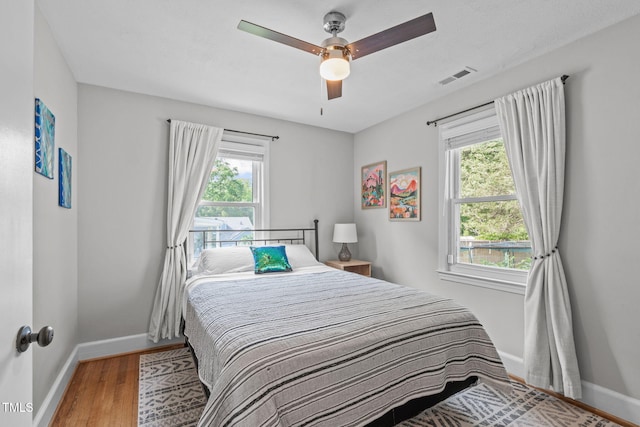 1209 Edgevale Rd, Durham, NC 27701 - bedroom featuring wood finished floors and ceiling fan