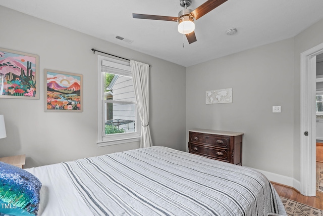 1209 Edgevale Rd, Durham, NC 27701 - bedroom featuring wood finished floors and a ceiling fan
