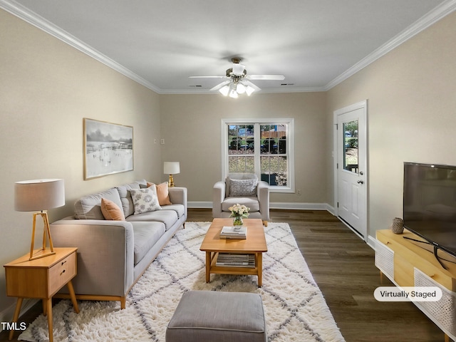 living room with ornamental molding, ceiling fan, and wood-type flooring