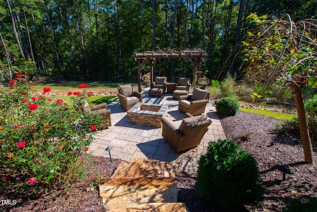 view of patio with a fire pit and a pergola