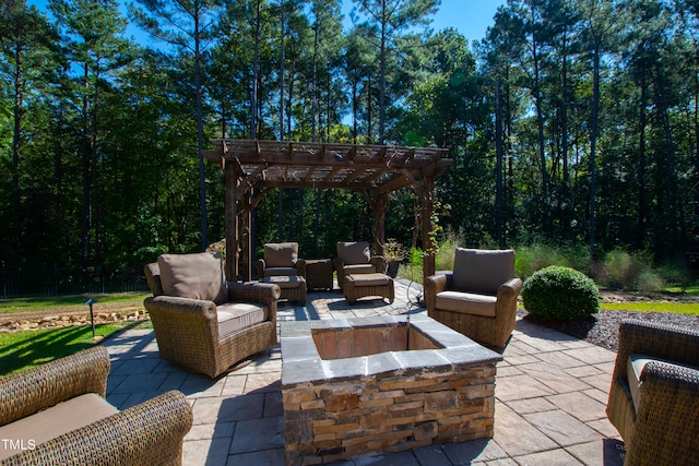 view of patio / terrace featuring a fire pit and a pergola