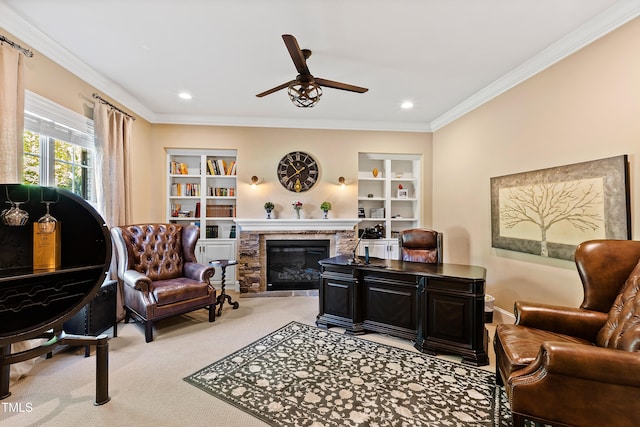 living room featuring ceiling fan, a stone fireplace, light colored carpet, and crown molding