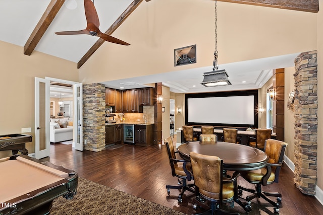 dining room with high vaulted ceiling, beamed ceiling, dark wood-type flooring, pool table, and wine cooler