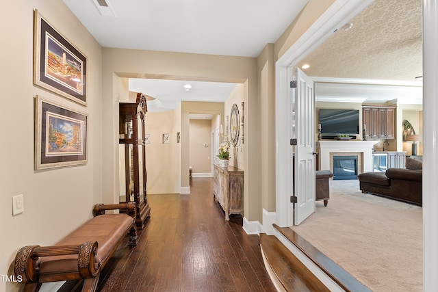 hall with wood-type flooring