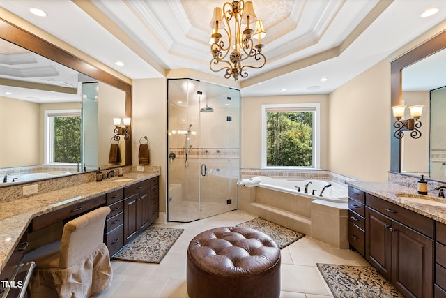 bathroom featuring plenty of natural light, tile patterned flooring, vanity, and shower with separate bathtub