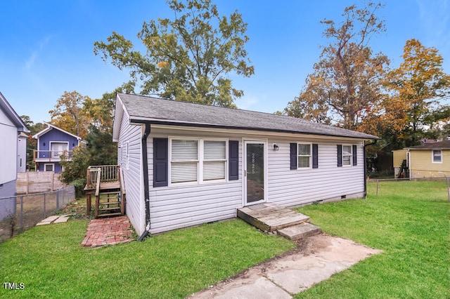 view of front facade with a front yard