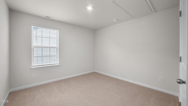 unfurnished room featuring carpet floors