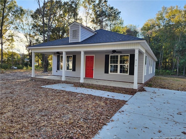 bungalow-style house with ceiling fan and a porch