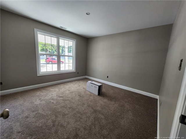 view of carpeted spare room