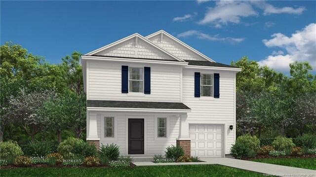 view of front facade featuring a garage and a front yard