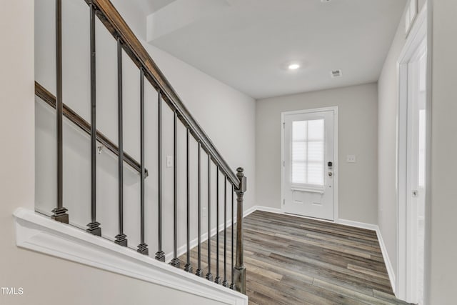 foyer entrance featuring hardwood / wood-style flooring