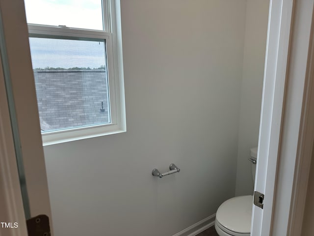 bathroom featuring toilet