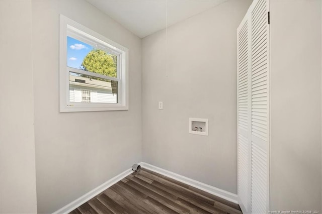 washroom featuring washer hookup and dark hardwood / wood-style floors