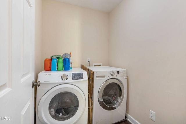 washroom featuring separate washer and dryer