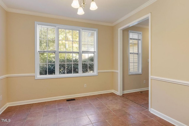 65 Applegate Dr, Franklinton, NC 27525 - spare room featuring plenty of natural light, ornamental molding, baseboards, and a chandelier