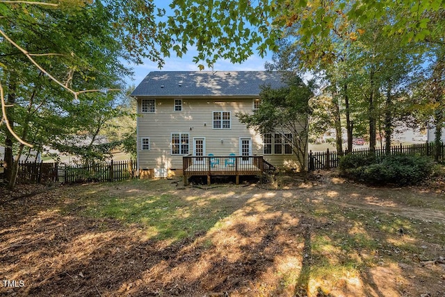65 Applegate Dr, Franklinton, NC 27525 - back of property featuring a fenced backyard, a wooden deck, and crawl space