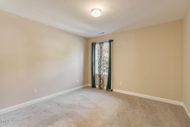 65 Applegate Dr, Franklinton, NC 27525 - unfurnished room featuring baseboards, light carpet, and visible vents