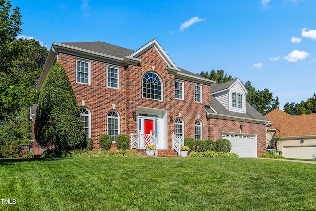 colonial inspired home with a front lawn