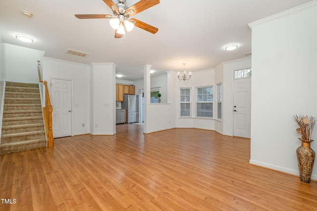 unfurnished living room featuring crown molding, light wood-type flooring, and ceiling fan with notable chandelier