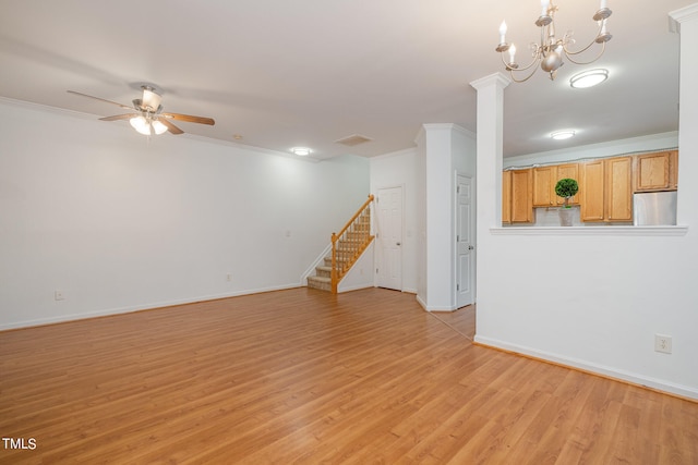 unfurnished living room with ceiling fan with notable chandelier, light hardwood / wood-style flooring, and ornamental molding