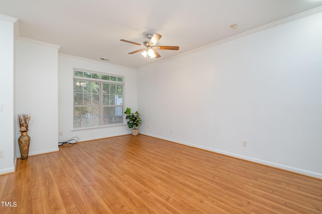 unfurnished room with ceiling fan, crown molding, and light hardwood / wood-style floors