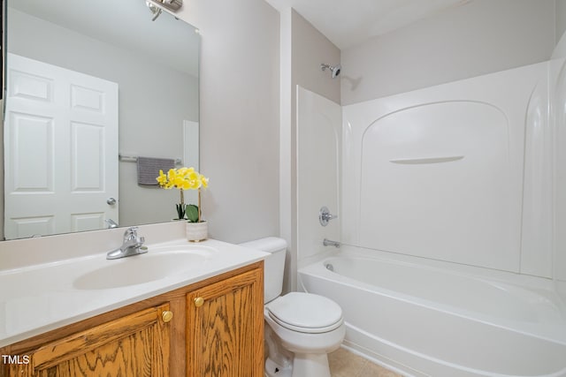 full bathroom with tub / shower combination, toilet, vanity, and tile patterned flooring