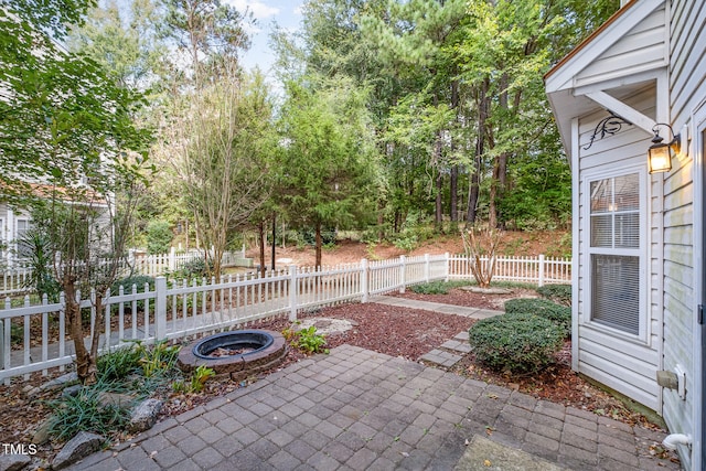 view of patio featuring a fire pit