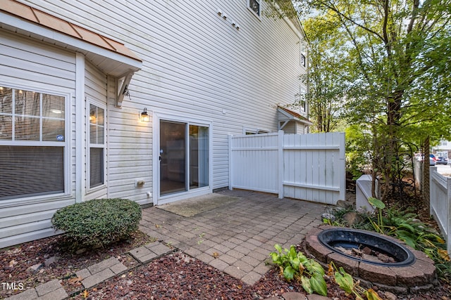 view of patio / terrace with an outdoor fire pit