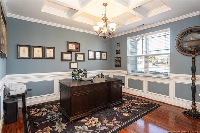 office space featuring coffered ceiling, beamed ceiling, hardwood / wood-style flooring, and crown molding