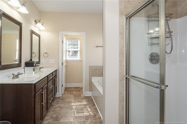 bathroom featuring vanity and plus walk in shower