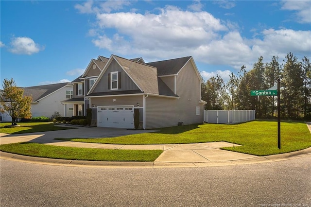 view of front facade with a front yard and a garage