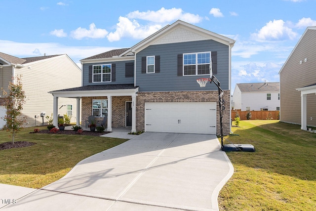 view of front of house featuring a front lawn and a garage