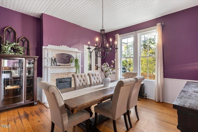 dining room featuring a chandelier and hardwood / wood-style flooring