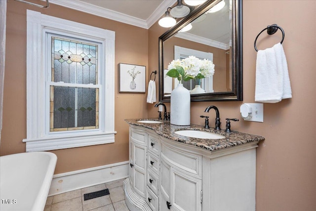 bathroom with tile patterned flooring, a bath, ornamental molding, and vanity