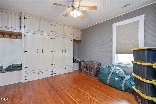 interior space with light wood-type flooring and ceiling fan