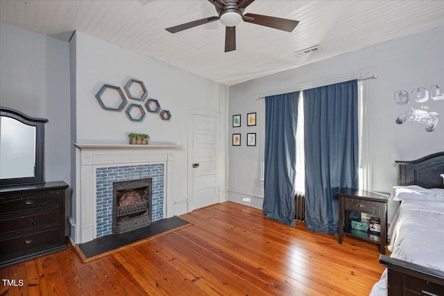 interior space with wood-type flooring and ceiling fan