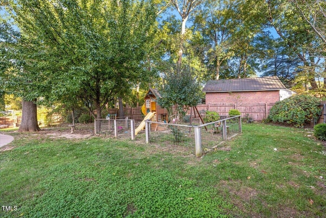 view of yard with a playground