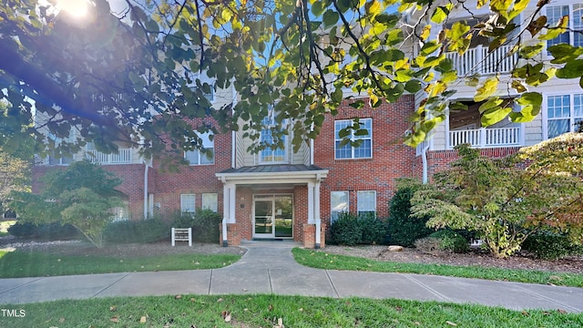 1414 Arborgate Cir, Chapel Hill, NC 27514 - view of front facade featuring brick siding