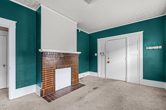 810 E Edenton St, Raleigh, NC 27601 - unfurnished living room with carpet, crown molding, a fireplace, and a textured ceiling